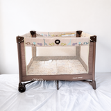 Graco Pack 'N Play Baby Playard Portable Travel Cot B138 in Some Used condition featuring foldable design, breathable mesh sides, animal print, and a spacious enclosed area for supervised play and rest.