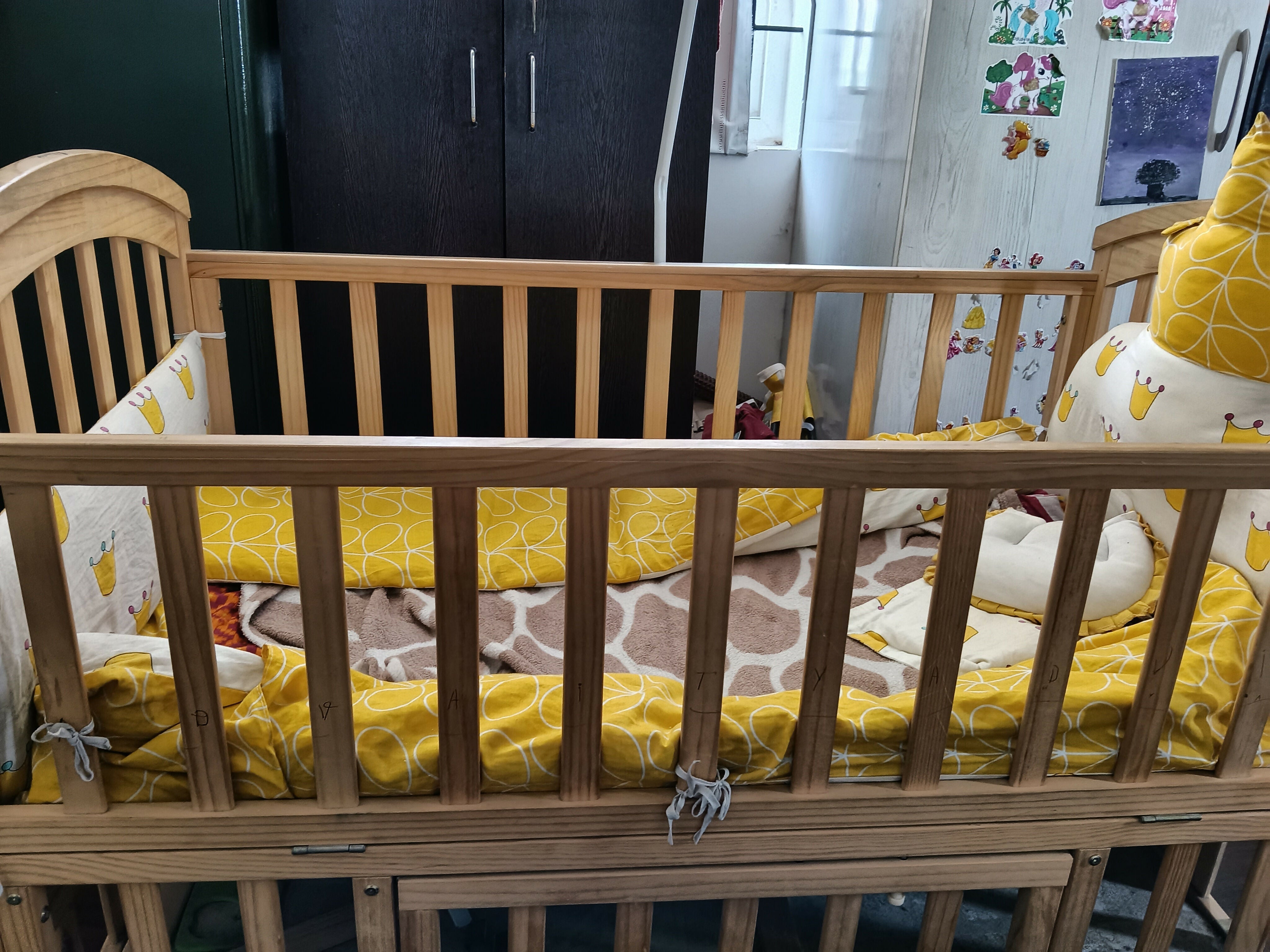 HUNYHUNY 15 in 1 Baby Cot/Crib with Mattress in Some Used condition featuring a versatile multifunctional design, sturdy frame, protective side rails, and included mattress for a comfortable baby sleeping space.