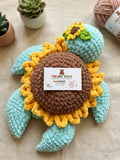 Handmade Crochet Sunflower Turtle Amigurumi Plushie crafted from soft yarn with a charming sunflower shell design, detailed hand-stitched finish, and a cuddly texture for gifting, décor, and imaginative play.