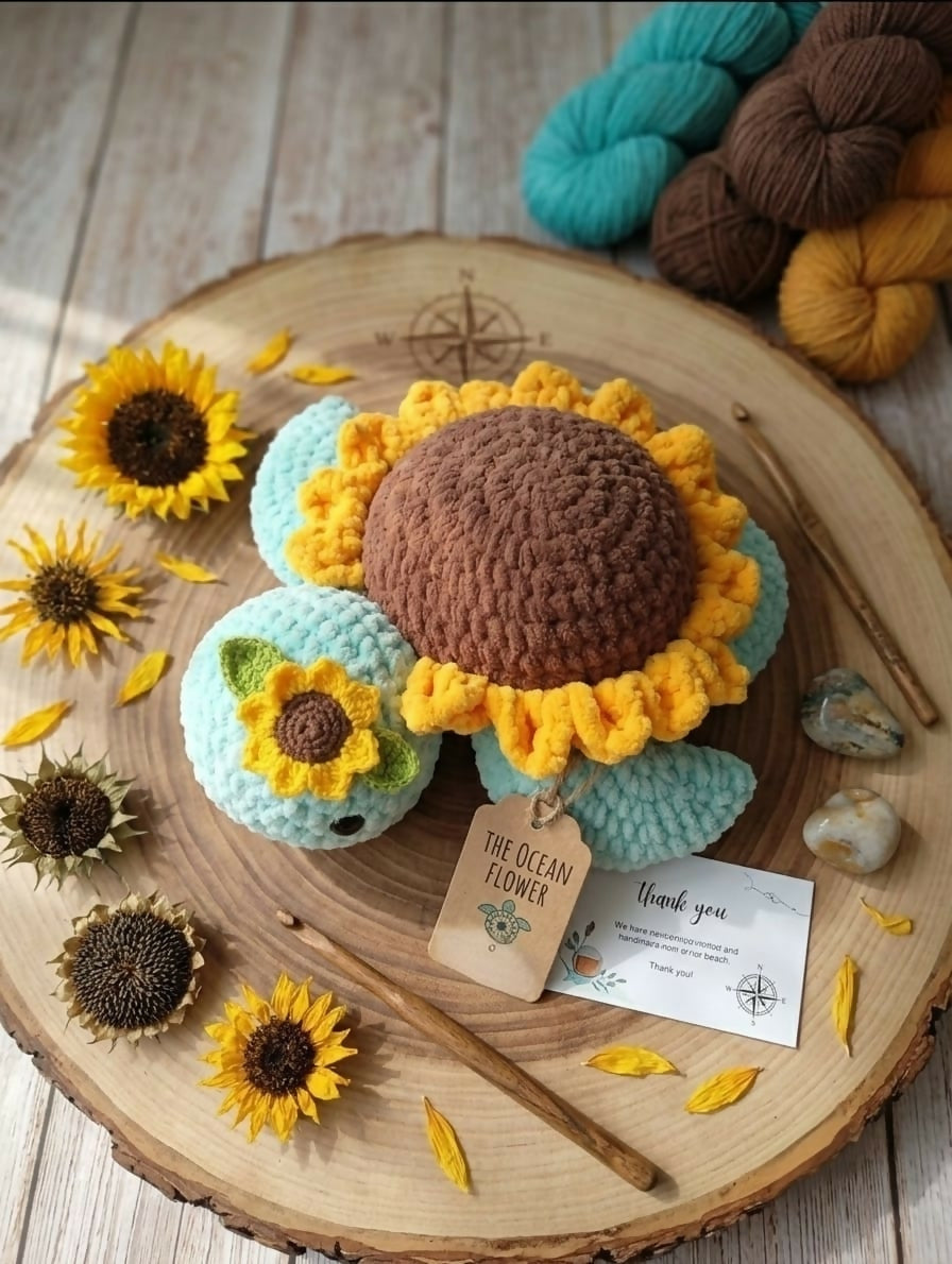 Handmade Crochet Sunflower Turtle Amigurumi Plushie crafted from soft yarn with a charming sunflower shell design, detailed hand-stitched finish, and a cuddly texture for gifting, décor, and imaginative play.