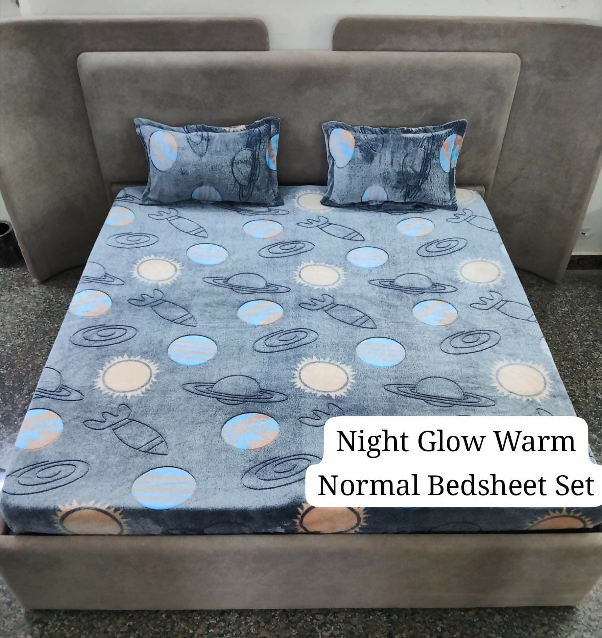 Gray bedsheets with space-themed pattern