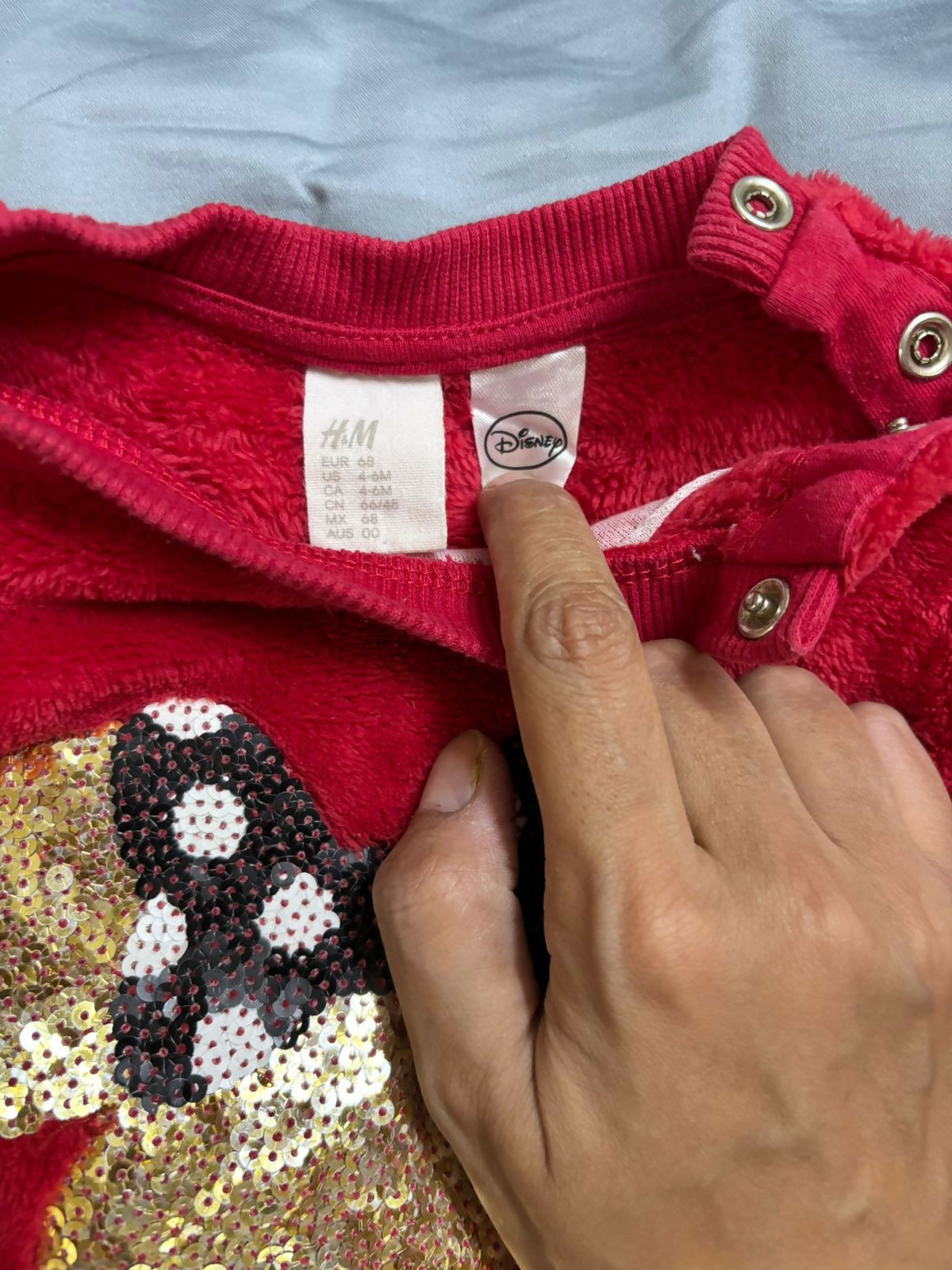 Wrap your little one in warmth and magic with this soft faux fur sweater from H&M’s Disney collection.