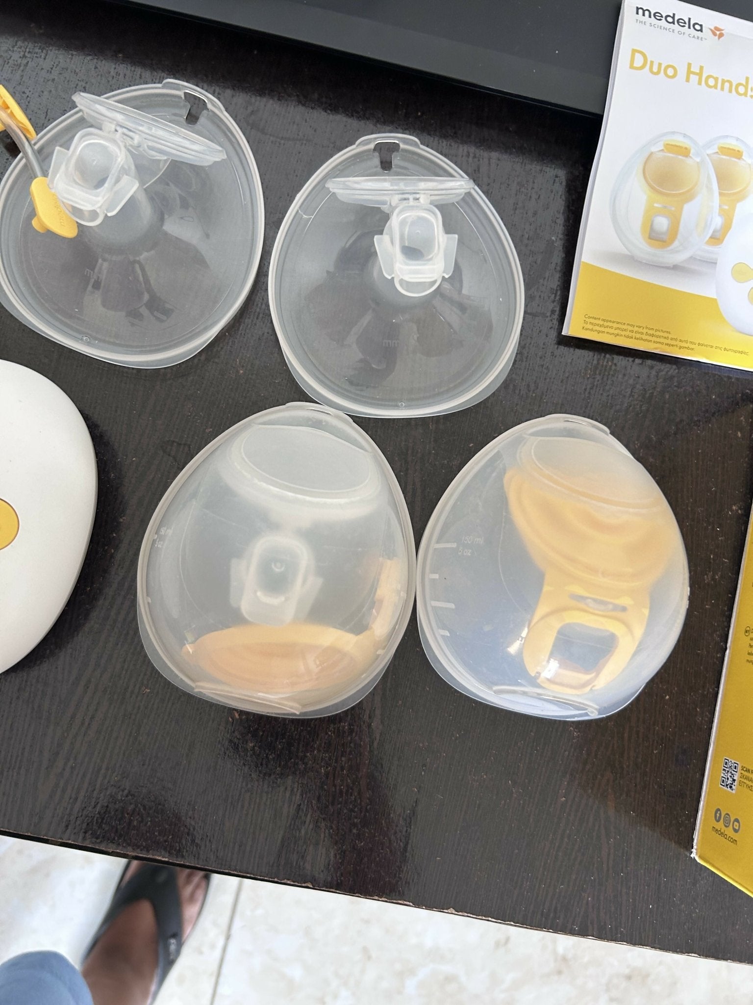 Medela Duo Wearable Electric Breast Pump with a hands-free in-bra design, adjustable suction levels, rechargeable battery, and soft breast shields for comfortable and efficient milk expression.