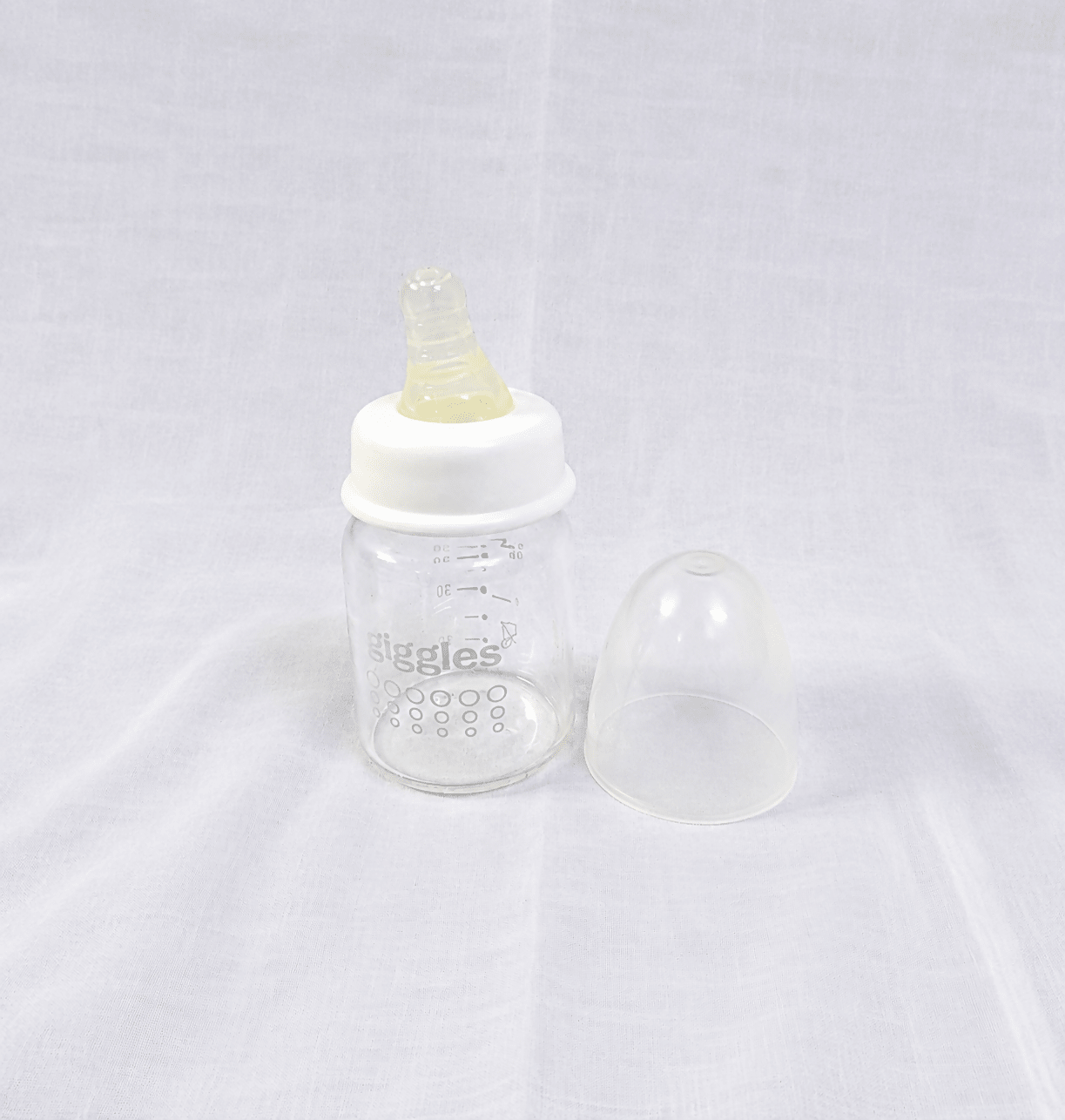 Giggles 50ml Baby Feeding Bottle with BPA-free construction, soft silicone nipple, compact design, and easy-to-hold shape for safe, comfortable feeding of newborns and infants.
