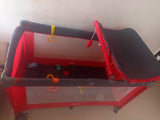 Babyhug playpen with mosquito net, helper rings, cot mobile and diaper changing table, foldable and travel-friendly, used for 7 months