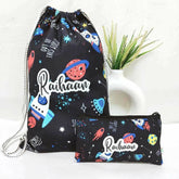 Black drawstring bag and pouch with space-themed design and 'Raihaan' branding on a white background.