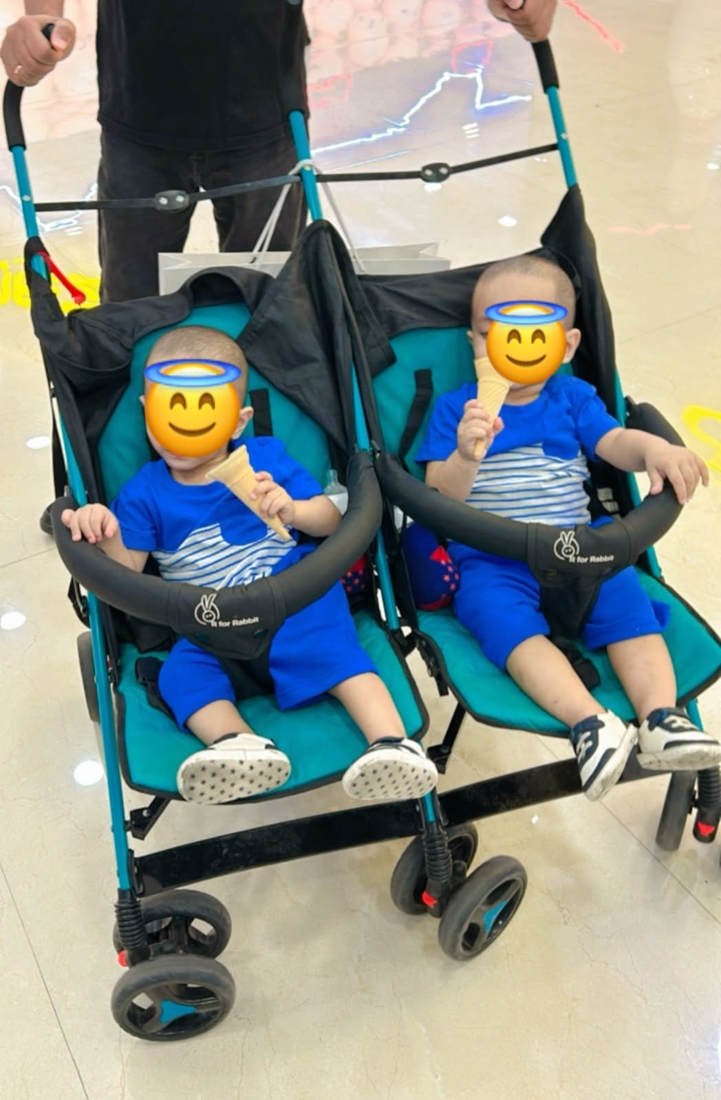 R for Rabbit Ginny & Johnny twin stroller with dual seating, safety harnesses, smooth wheels, adjustable canopies, and comfortable travel support for twins or siblings.