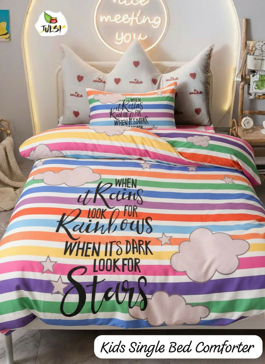 Colorful striped bed comforter with motivational quote on a bed