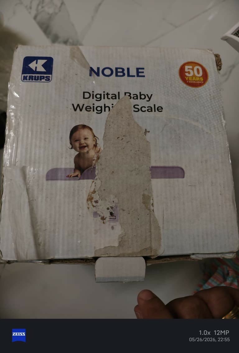 KRUPS Noble digital baby weighing scale with accurate weight measurement, easy-to-read display, stable platform, and convenient monitoring for infants and growing babies.