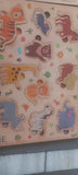 Wooden puzzle for kids with colorful pieces, smooth child-safe edges, and an engaging educational design that encourages problem-solving, hand-eye coordination, shape recognition, and fine motor skill development.