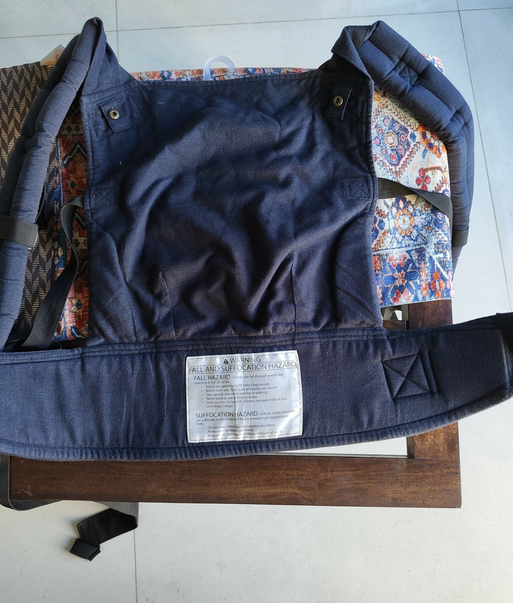Kol Kol baby carrier with ergonomic support, adjustable straps, cushioned comfort, secure baby carrying design, and hands-free support for babies and toddlers.
