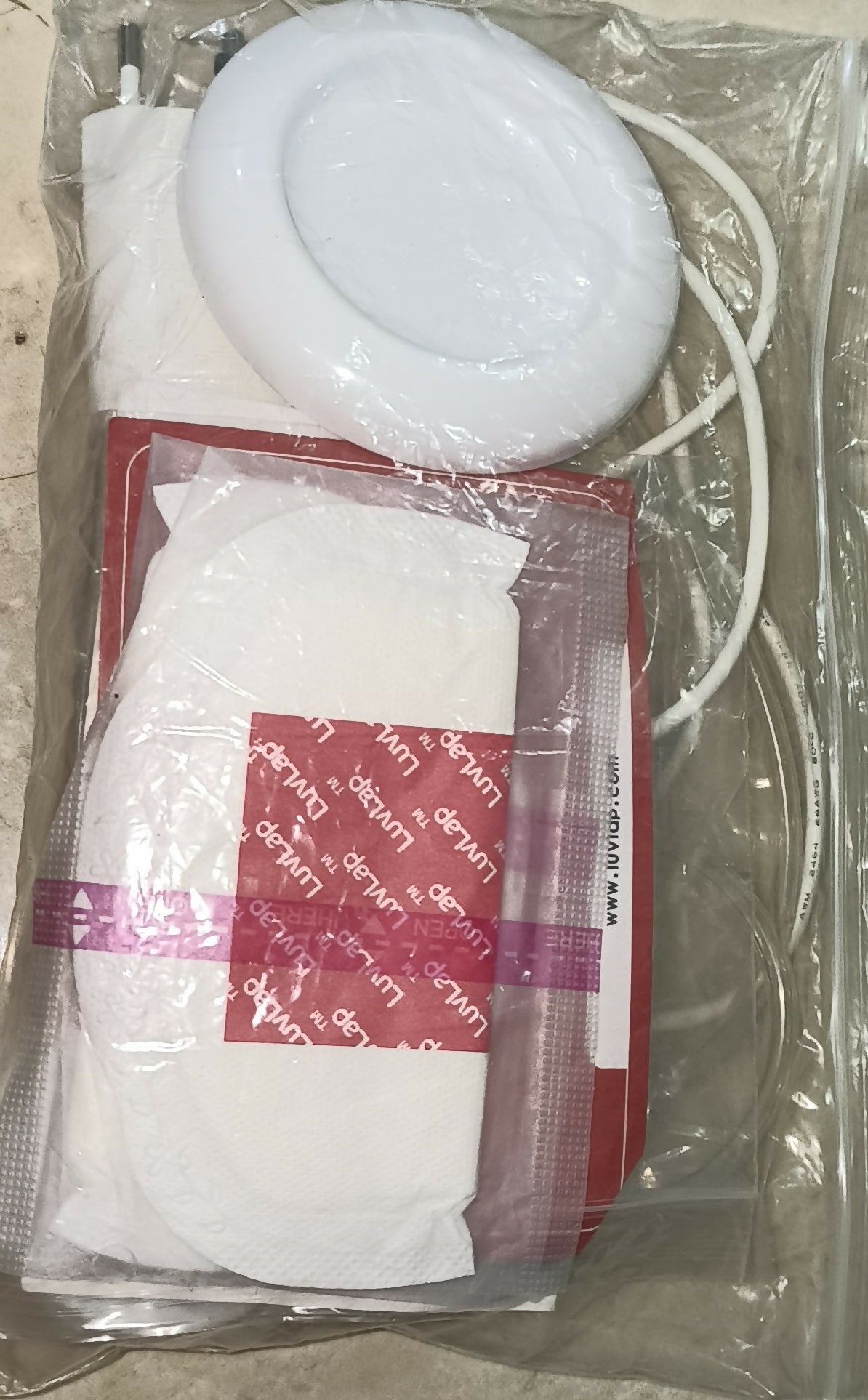 LuvLap Adore Electric Breast Pump featuring 2-phase pumping, rechargeable battery, digital touchscreen, smart memory and dual power mode, with soft breast cushion and 2 breast pads included.