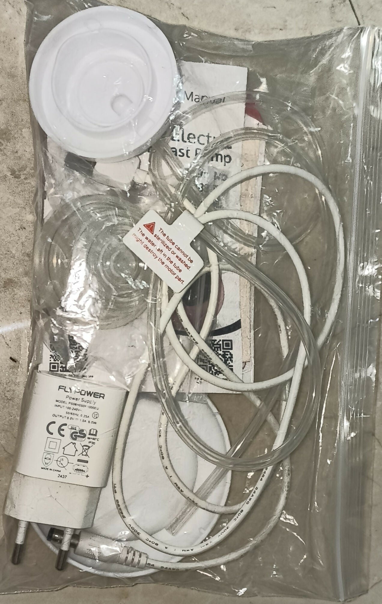 LuvLap Adore Electric Breast Pump featuring 2-phase pumping, rechargeable battery, digital touchscreen, smart memory and dual power mode, with soft breast cushion and 2 breast pads included.