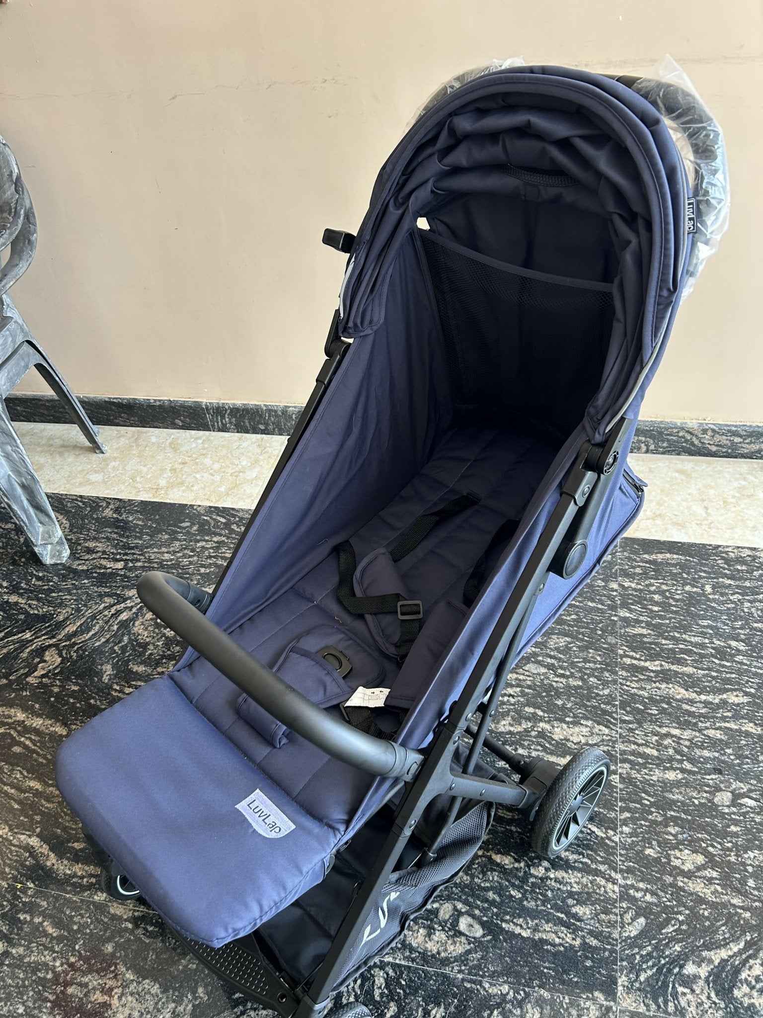 LuvLap Royal stroller with reclining seat, foldable design, safety harness, adjustable canopy, smooth wheels, and comfortable travel support for babies and toddlers.