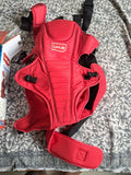 LuvLap Galaxy baby carrier in red with ergonomic support, adjustable straps, cushioned comfort, secure carrying design, and hands-free convenience for babies and parents.