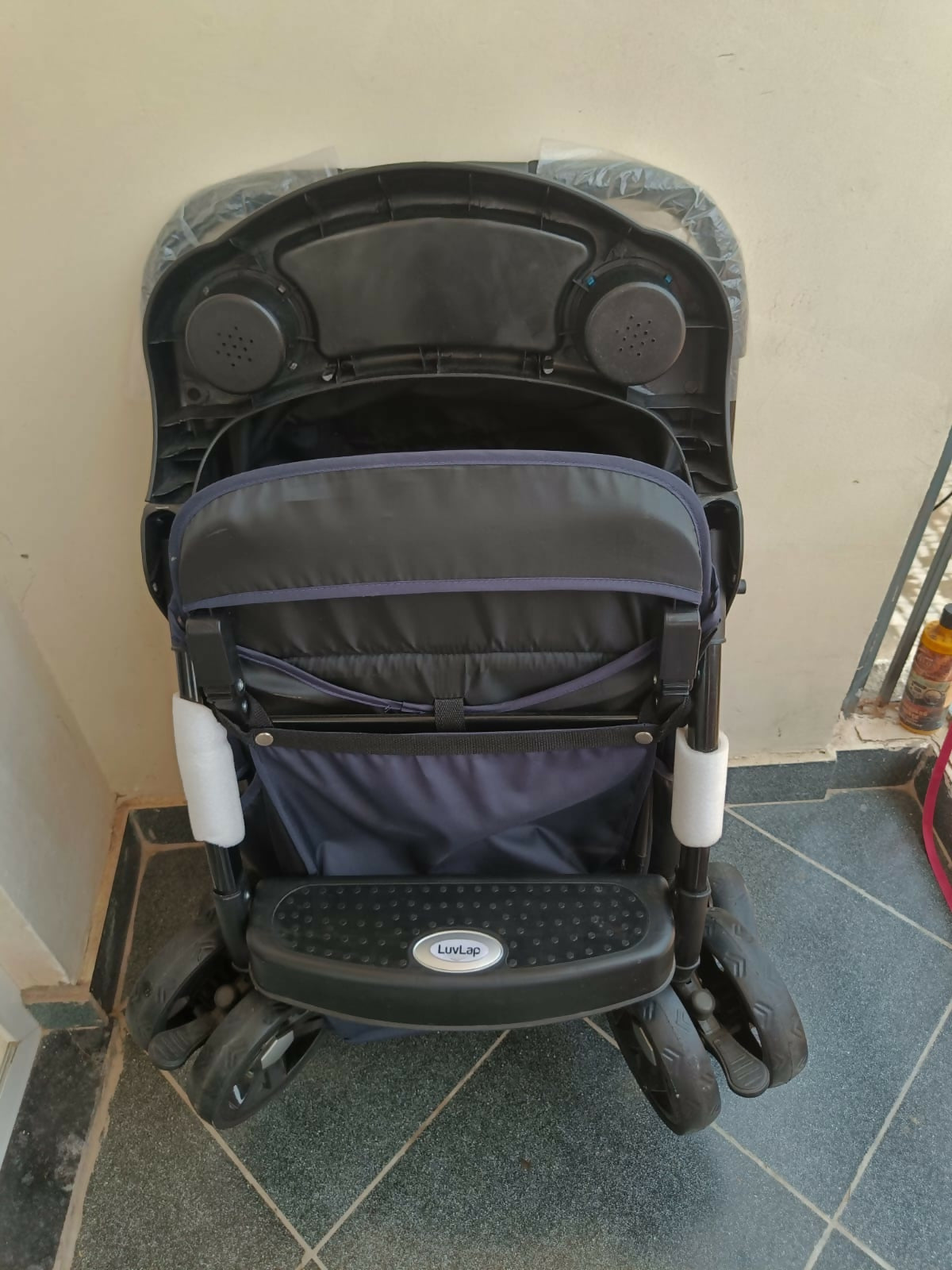 LUVLAP Baby Stroller/Pram in Preloved New condition featuring comfortable seating, protective canopy, safety harness, smooth-moving wheels, and a practical design for everyday walks, shopping, travel, and outings with your baby.