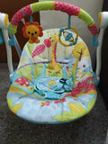 Mastela Deluxe Portable Swing Aqua with a comfortable cushioned seat, soothing swing motion, secure safety harness, compact foldable design, and calming features for babies.