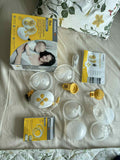 MEDELA Duo Hands-Free Wearable Electric Breast Pump with dual wearable collection cups, adjustable suction levels, rechargeable battery, quiet operation, and hands-free design for comfortable milk expression.
