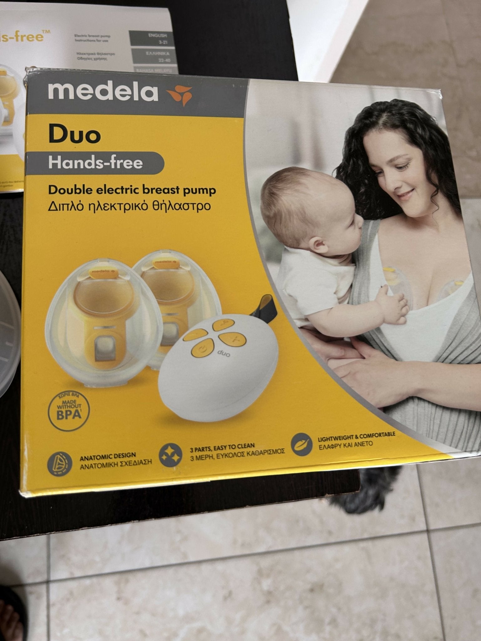 Medela Duo Wearable Electric Breast Pump with a hands-free in-bra design, adjustable suction levels, rechargeable battery, and soft breast shields for comfortable and efficient milk expression.