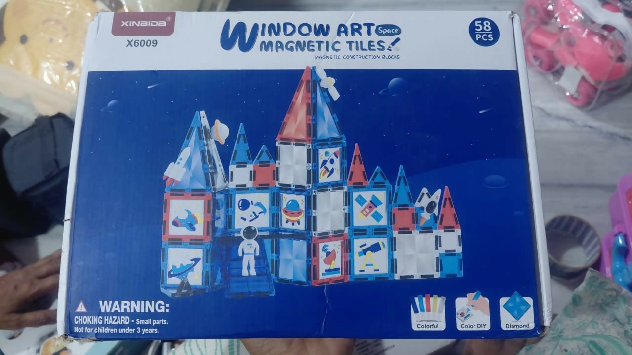 Magnetic tiles with window art set featuring colorful magnetic building pieces, creative window designs, and hands-on construction play for learning, imagination, and STEM development.