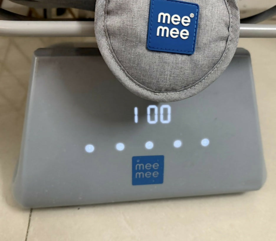 Mee Mee Electric Swing Rocker Chair in Grey, Almost New condition, available in Hyderabad, featuring gentle swinging and rocking motion, comfortable padded seating, safety harness, and supportive design for supervised baby relaxation and playtime.
