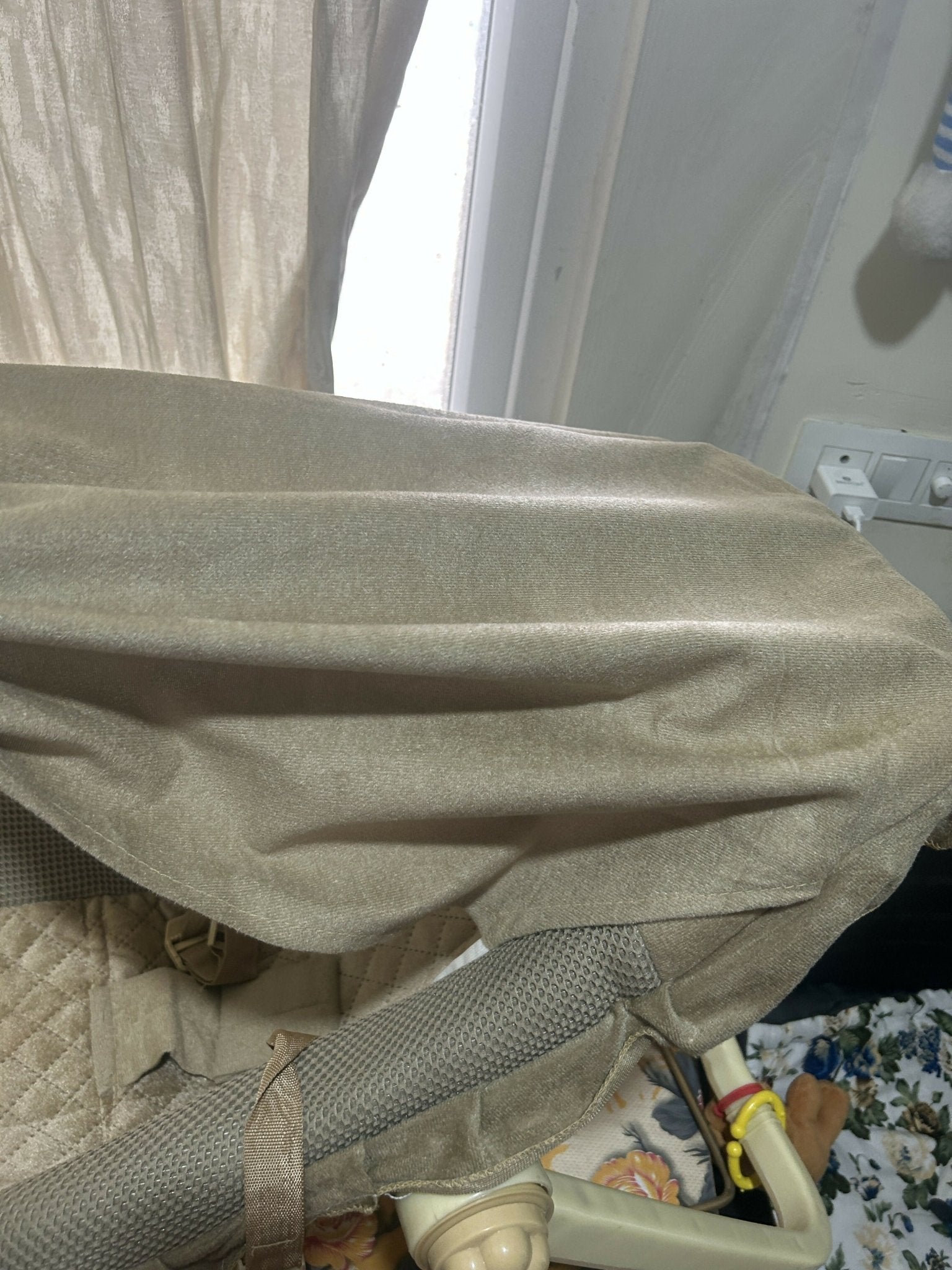 Premium 12 in 1 musical carry cot and bouncer with mosquito net, storage box, cushioned seating, soothing music features, and multi-functional design for baby comfort, play, and rest.