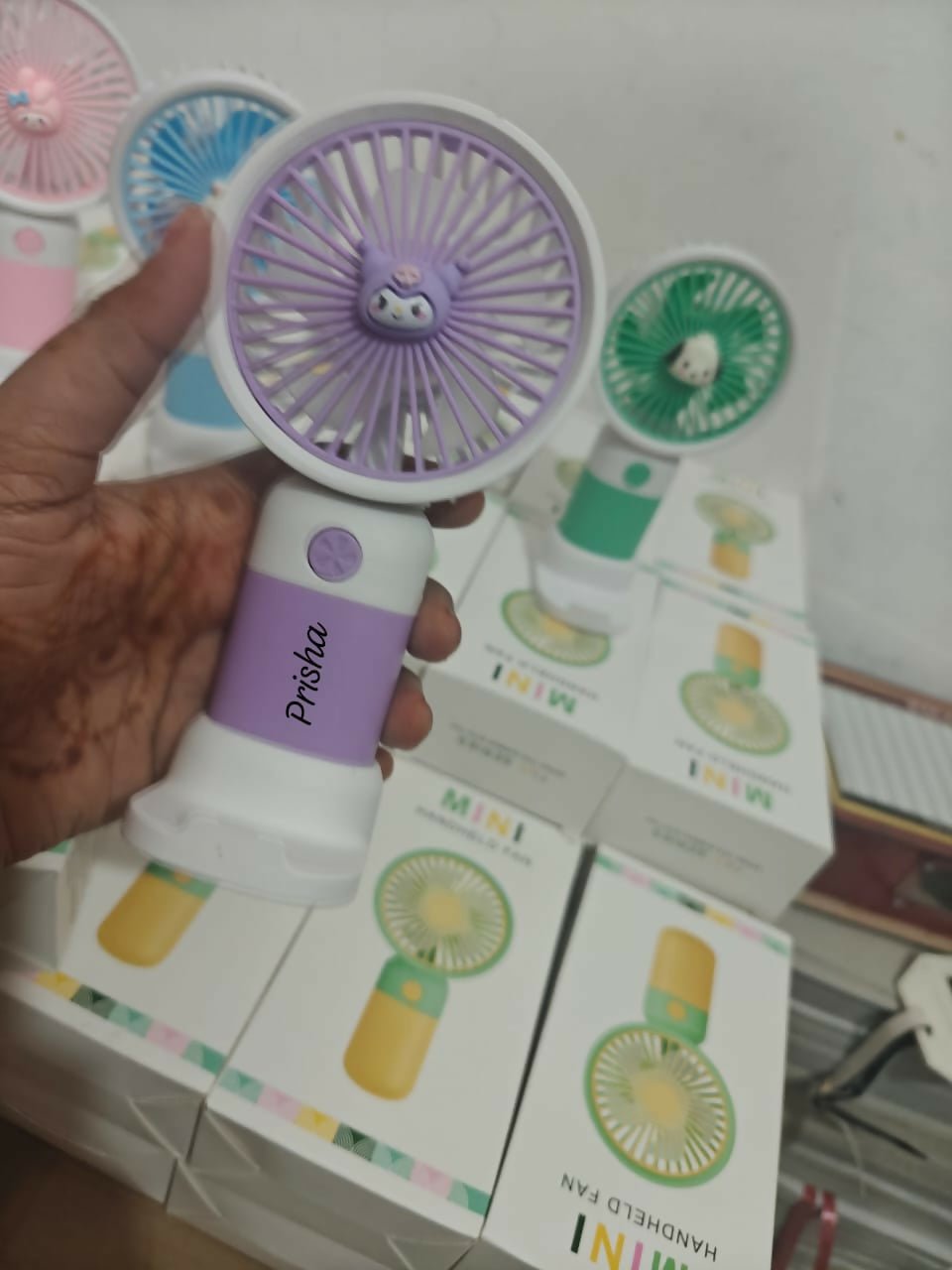 Personalized portable fan with stand and mobile holder featuring compact design, custom personalization, adjustable support, hands-free convenience, and cooling comfort for everyday use.