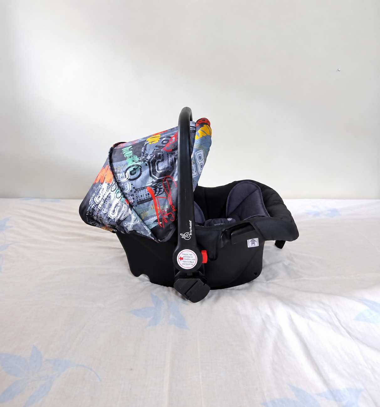 R FOR RABBIT Picaboo 4-in-1 Baby Car Seat B149 in Almost New condition, designed for versatile use as a car seat, carry cot, rocker and feeding chair with comfortable padded seating and convenient carry handle.