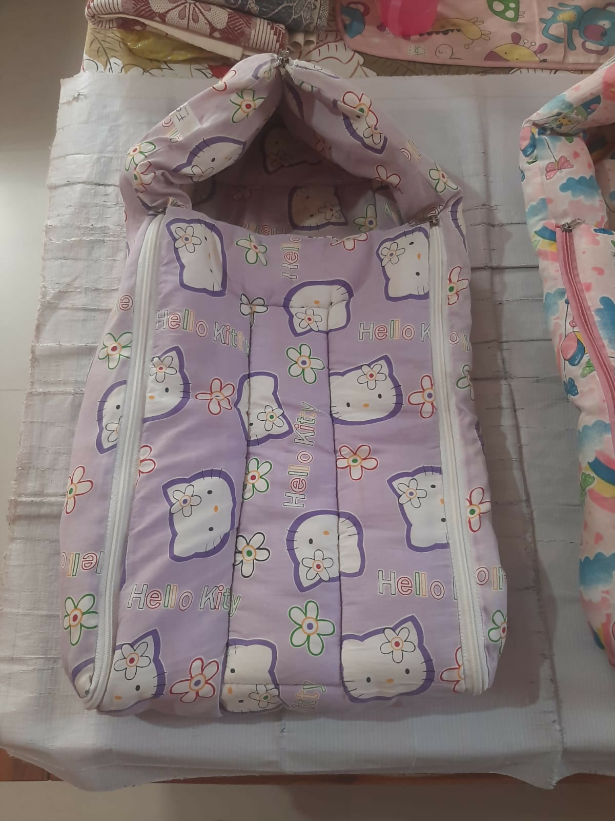 FARETO Baby Wrapper/Baby Nest Combo of 2 in Almost New condition featuring soft, cozy and cushioned designs for wrapping, carrying, supervised resting, and keeping newborns and infants comfortable.