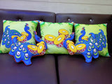 Colorful peacock-patterned cushions