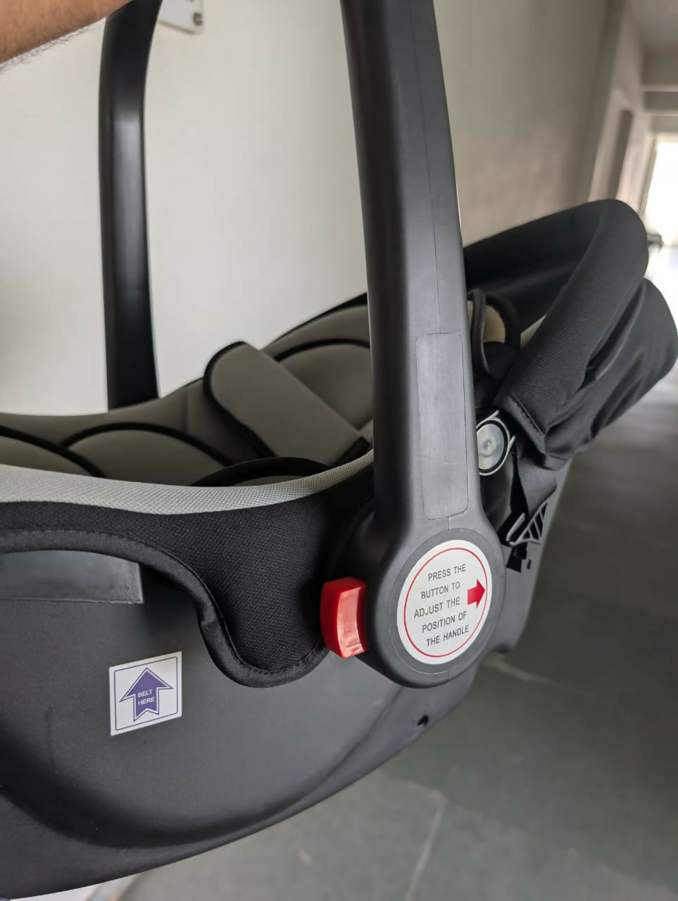 Close-up of a car seat with a visible label