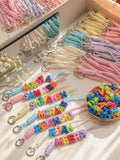 Personalized Beaded Name Keychain featuring a custom name made with colorful beads, durable keyring, and charming handcrafted design for bags, keys, return gifts, and special occasions.