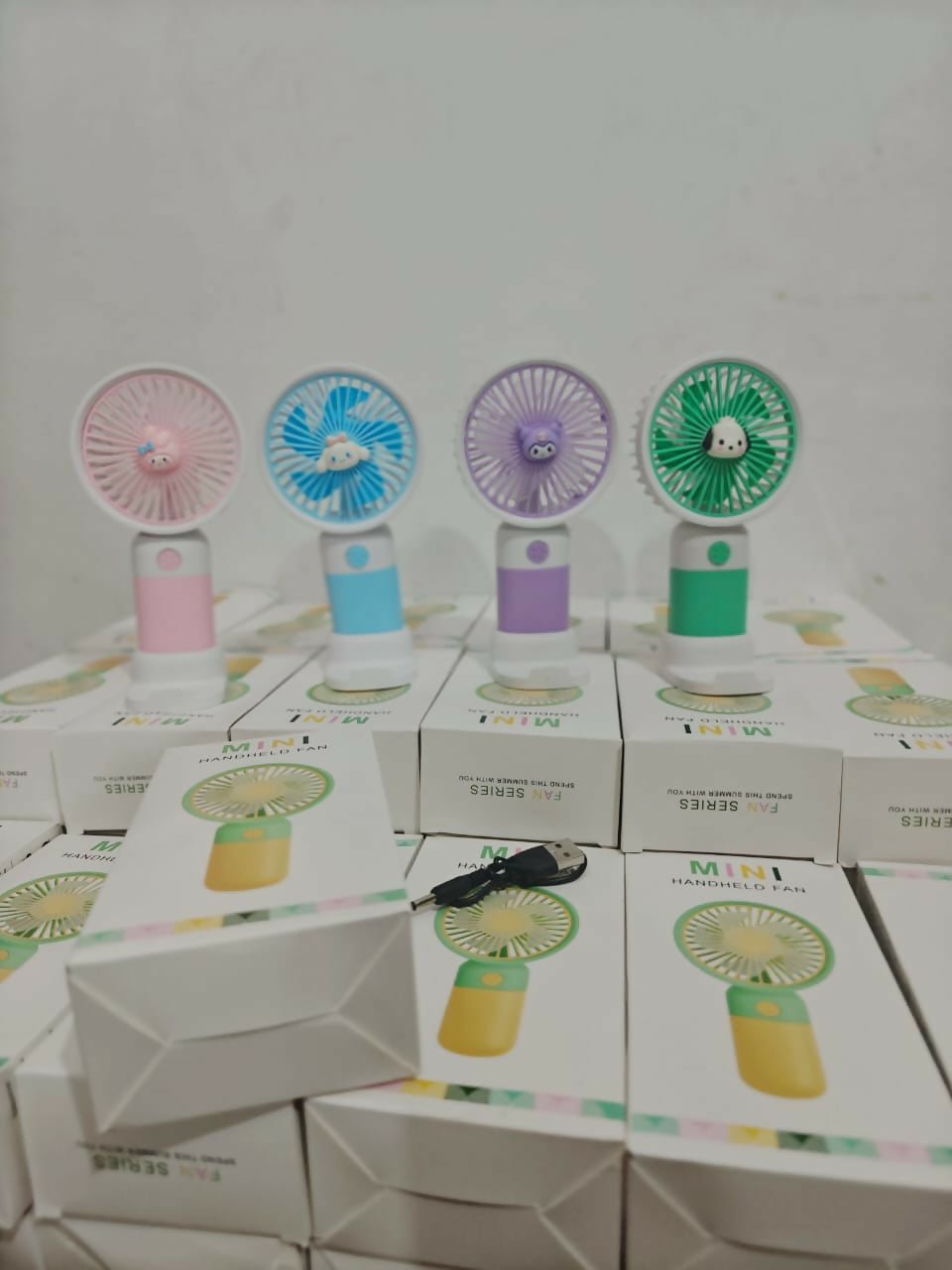 Personalized portable fan with stand and mobile holder featuring compact design, custom personalization, adjustable support, hands-free convenience, and cooling comfort for everyday use.