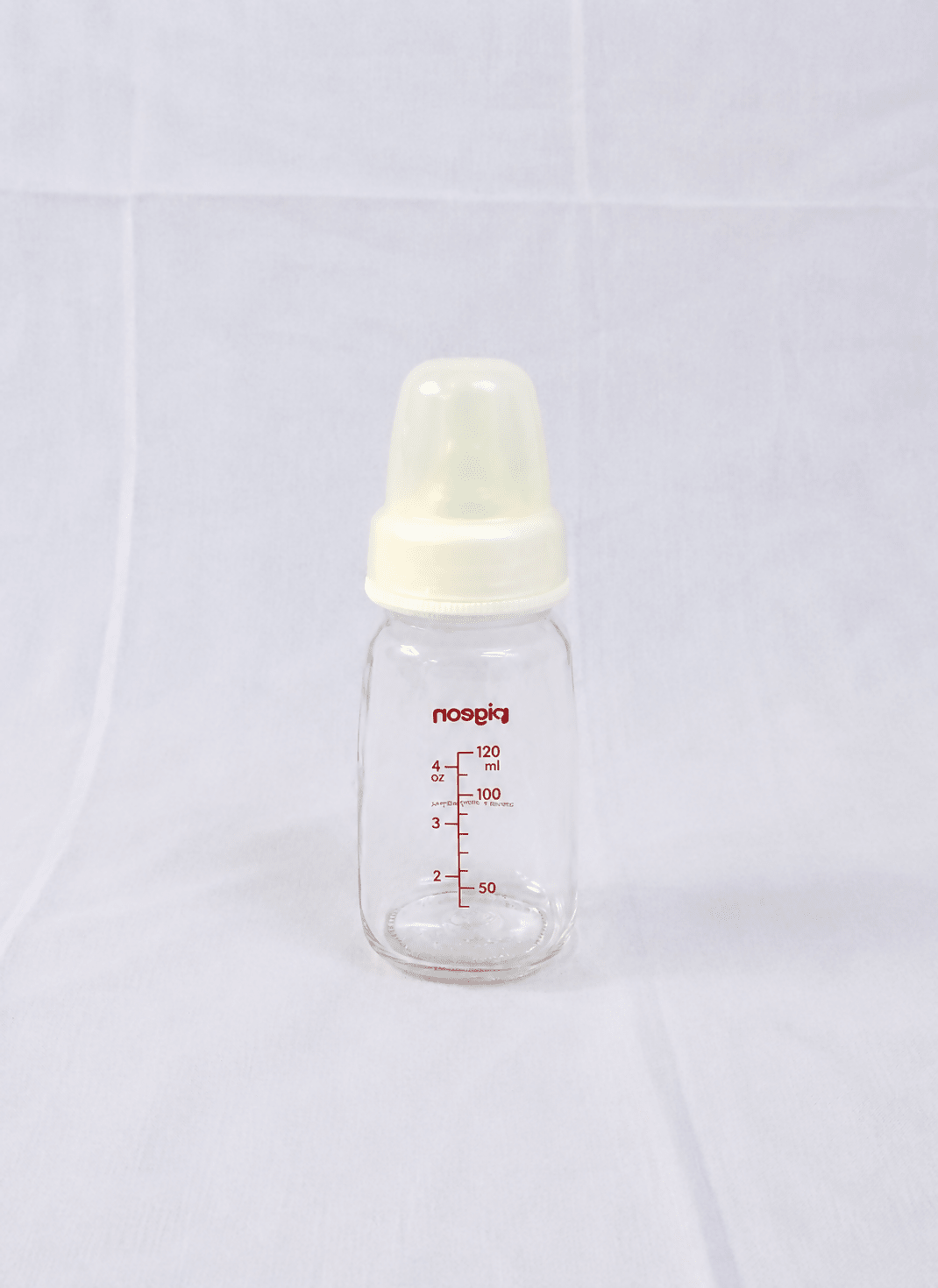 Pigeon 120ml Glass Feeding Bottle with Peristaltic silicone nipple, BPA-free glass, ergonomic shape, and durable design for safe, comfortable, and natural feeding for newborns and infants.