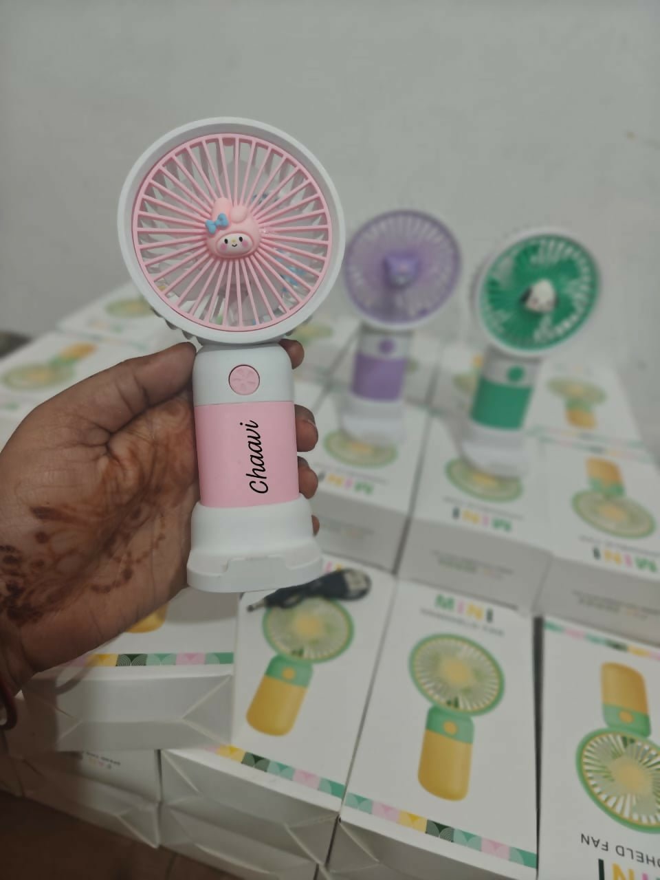 Personalized portable fan with stand and mobile holder featuring compact design, custom personalization, adjustable support, hands-free convenience, and cooling comfort for everyday use.