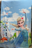 Frozen-themed blanket with Elsa and Olaf on a blue sky background