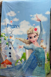 Frozen-themed blanket with Elsa and Olaf on a blue sky background