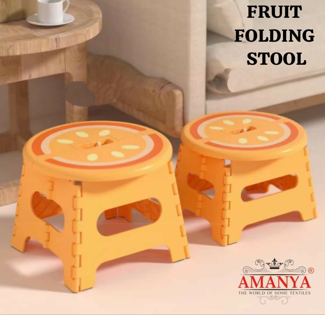 Two orange folding stools with fruit design