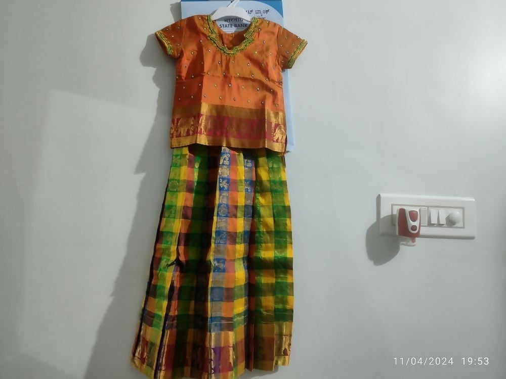 Dress your little girl in luxury and elegance with our Silk Lehenga and Blouse set, perfect for special occasions and celebrations.