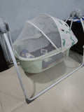 R for Rabbit automatic baby cradle with gentle swinging motion, comfortable sleeping space, sturdy frame, and soothing design to help newborns and infants relax and rest comfortably.