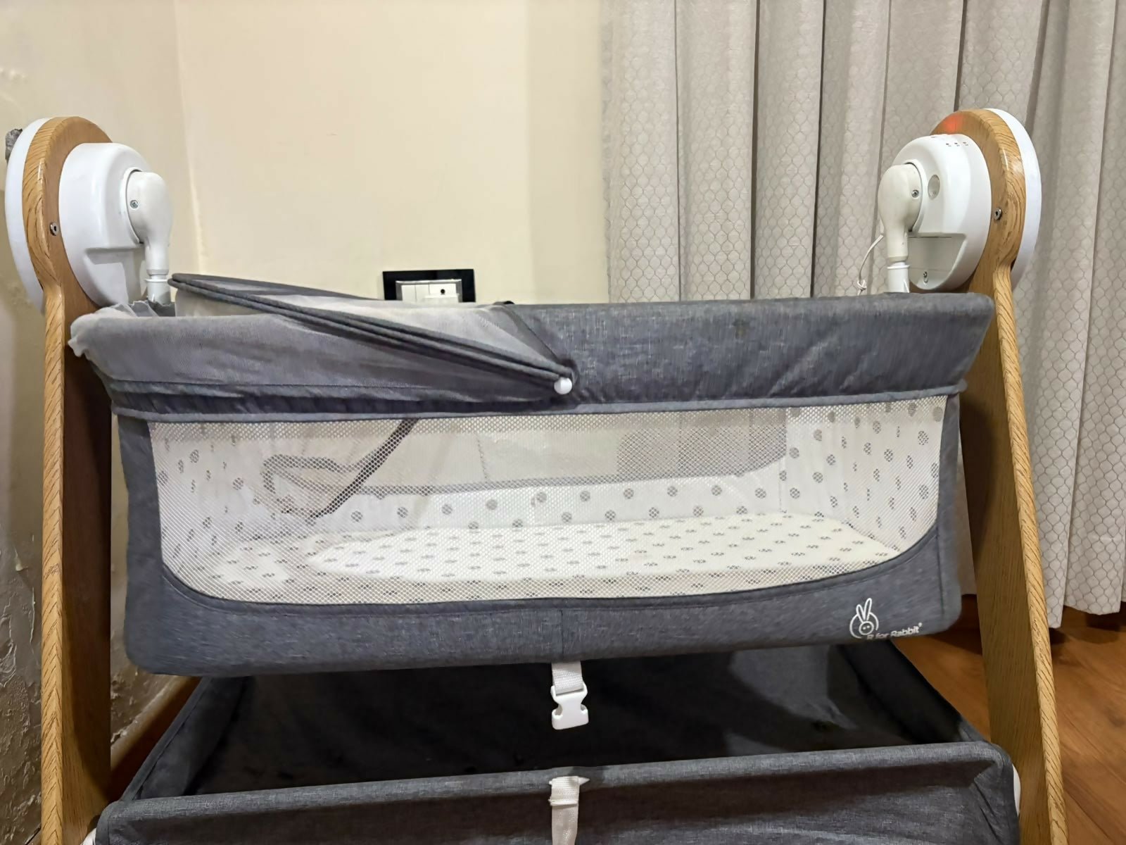 R FOR RABBIT Wooden Automatic Cradle with a sturdy wooden frame, gentle automatic rocking motion, comfortable sleeping area, breathable design, and secure construction for newborns and infants.