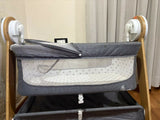 R FOR RABBIT Wooden Automatic Cradle with a sturdy wooden frame, gentle automatic rocking motion, comfortable sleeping area, breathable design, and secure construction for newborns and infants.