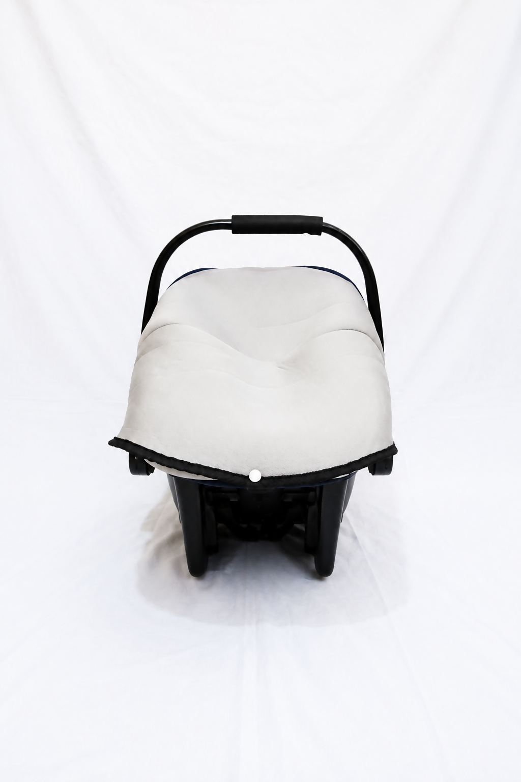 R for Rabbit infant car seat carrier with canopy, cushioned newborn support, secure safety harness, carry handle, and travel cot functionality for safe and comfortable journeys.