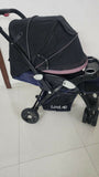LuvLap stroller/pram with a reclining seat, 5-point safety harness, adjustable canopy, smooth wheels, spacious storage basket, and a lightweight foldable design for everyday outings.