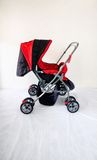 LuvLap Galaxy Baby Stroller Pram in Red & Black with reversible handle, reclining seat, adjustable canopy, safety harness, smooth wheels, foldable frame, and storage basket for comfortable baby travel.