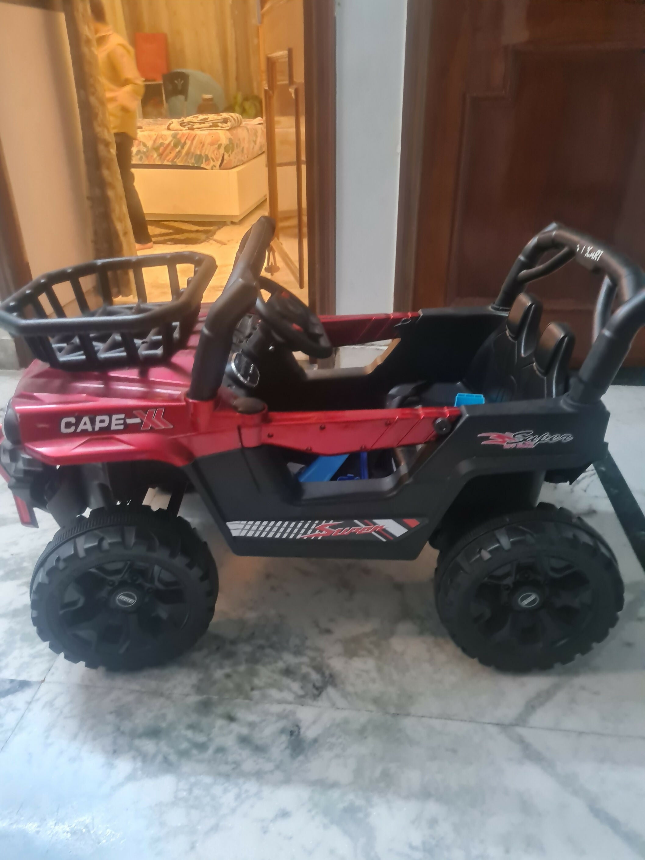 Kids Ride-On Car in Some Used condition featuring a fun car-inspired design, comfortable seat, steering wheel, and engaging ride-on experience for supervised indoor and outdoor play.