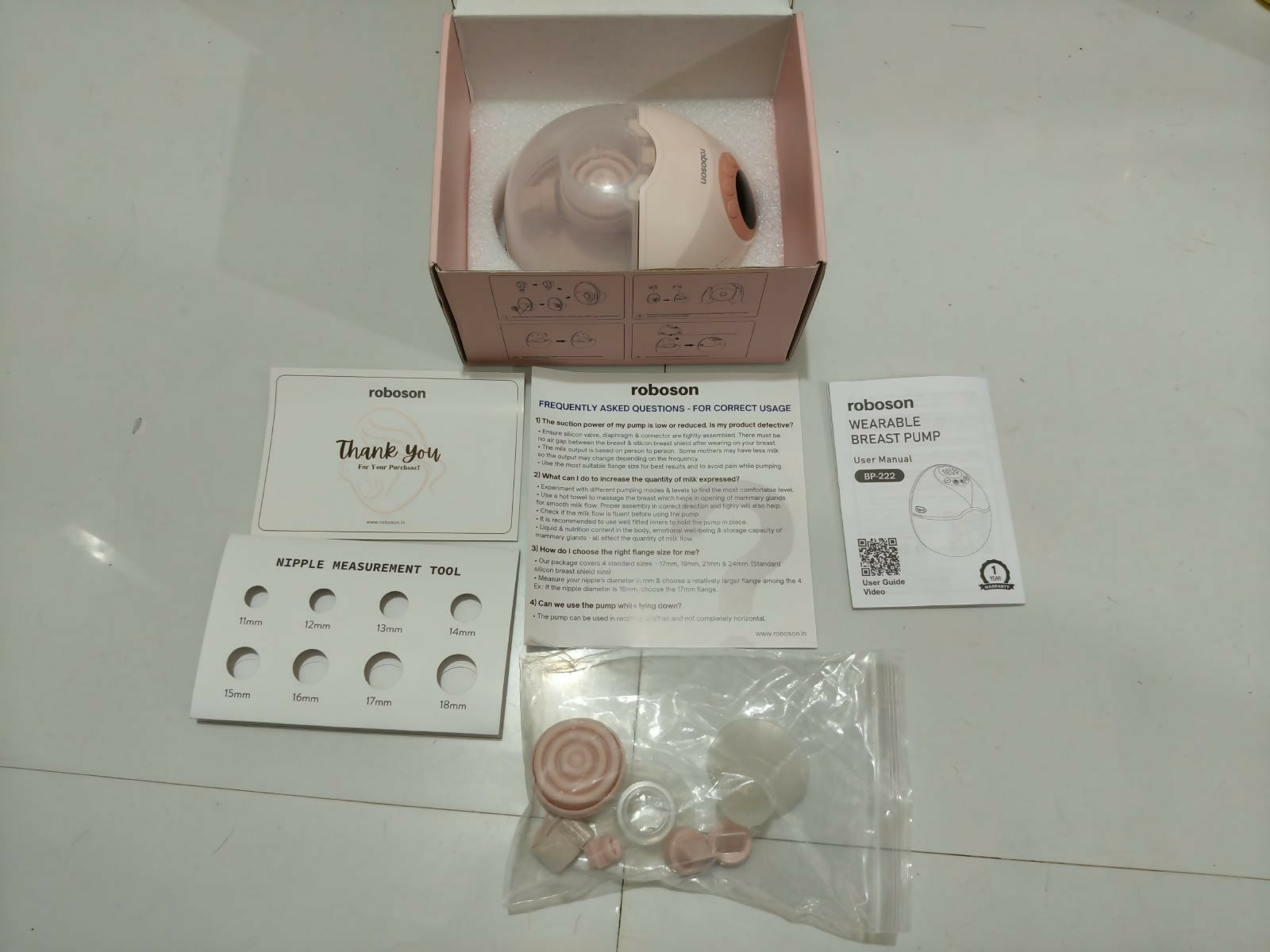 ROBOSON Wearable Electric Breast Pump featuring a compact hands-free design, adjustable pumping settings, comfortable fit, and portable operation for convenient breast milk expression at home or while travelling.