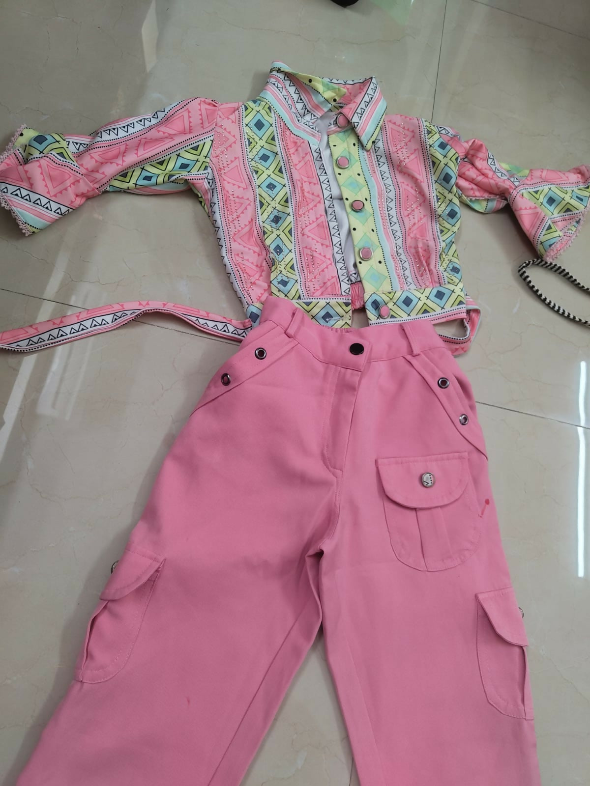 Pink outfit with patterned top and pants