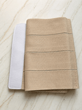 Sego abdominal binder post-pregnancy belt in beige with adjustable compression, supportive design, breathable fabric, and comfortable fit for postpartum abdominal support.