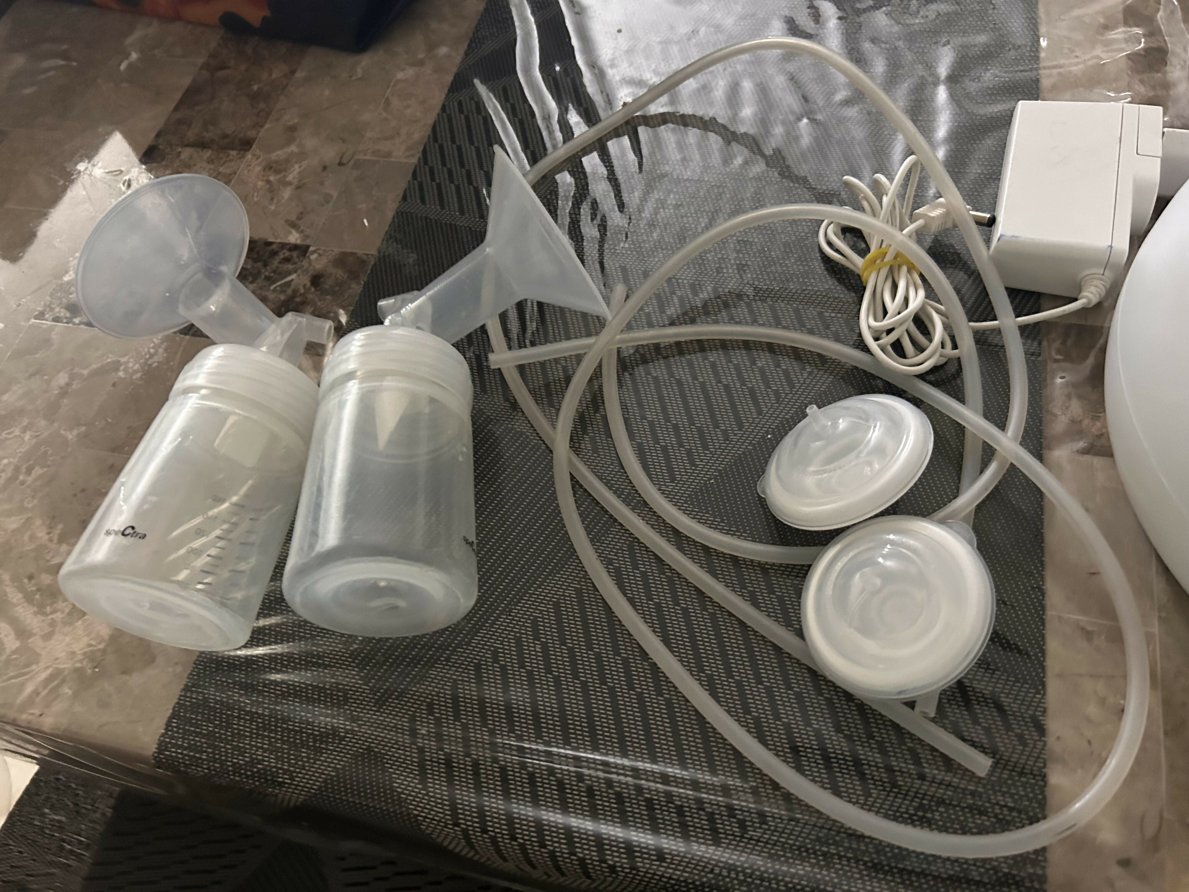 Spectra Electric Breast Pump with adjustable suction levels, massage mode, closed-system hygiene, quiet operation, BPA-free components, and ergonomic controls for comfortable and efficient milk expression.